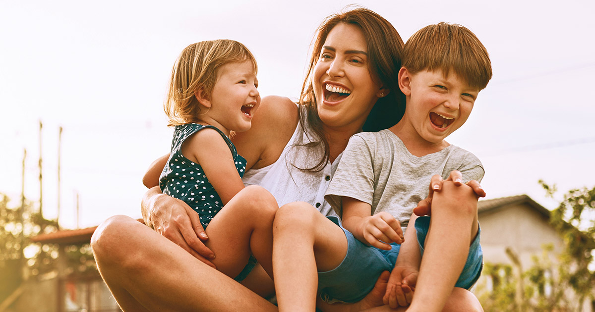 Happy family with mother and kids