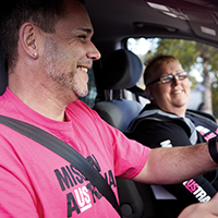 Mission Australia employees in a Missionbeat van