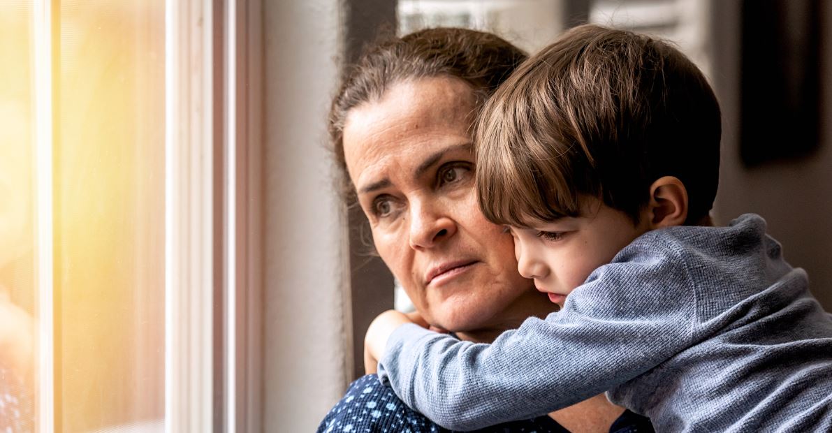 Mum and son looking out the window