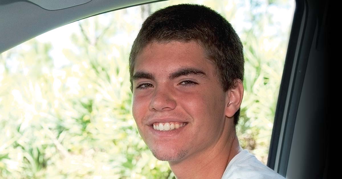 Cory smiles at the camera