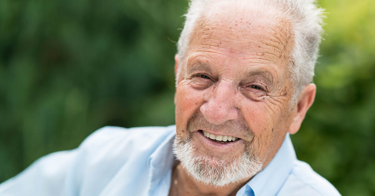 Elderly man looking happy
