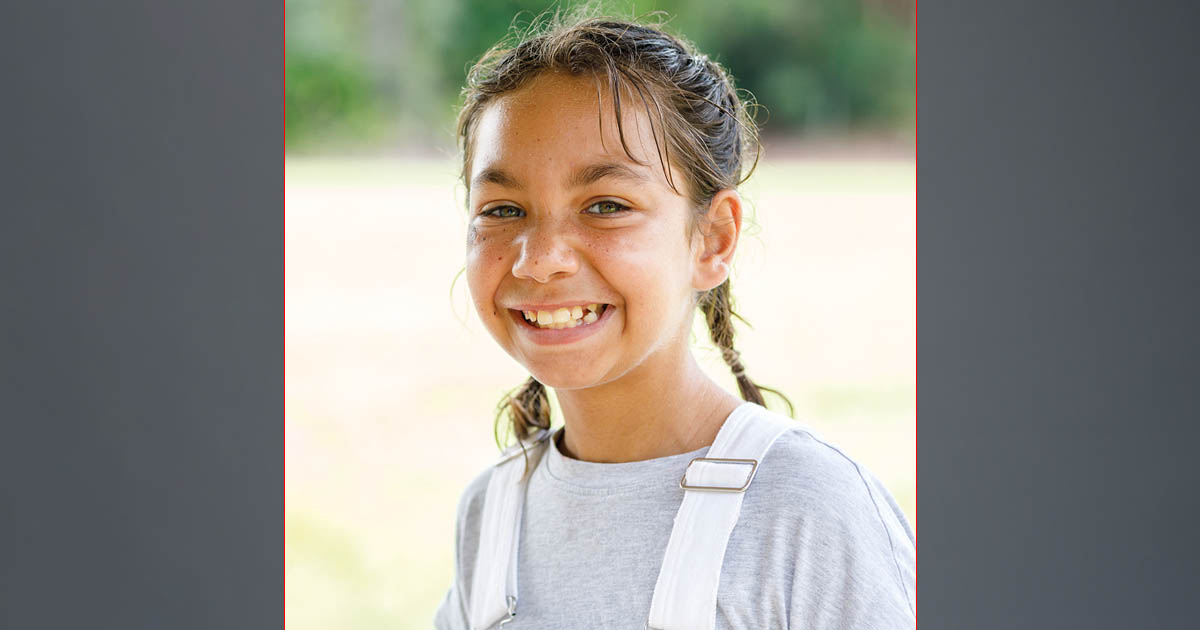 girl in overalls