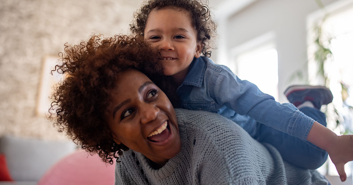 Mom and daughter looking happy