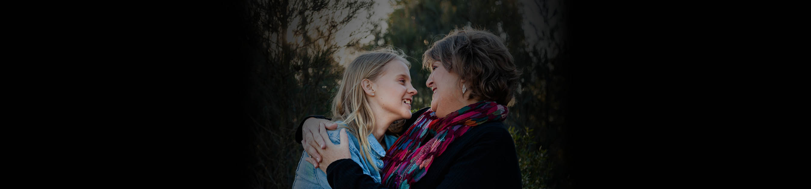 Mum and daughter hugging